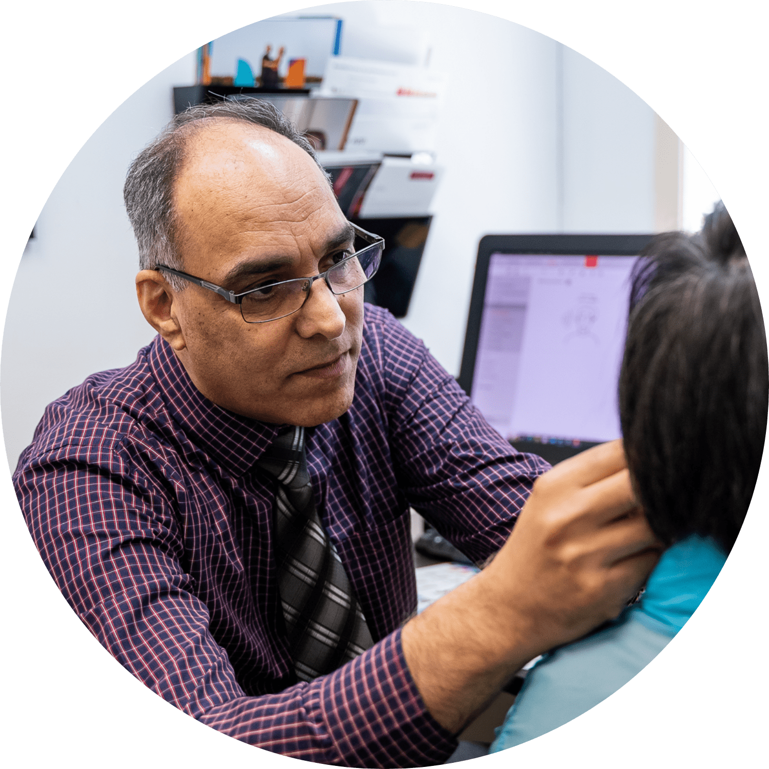 Provider fitting hearing aid to patient