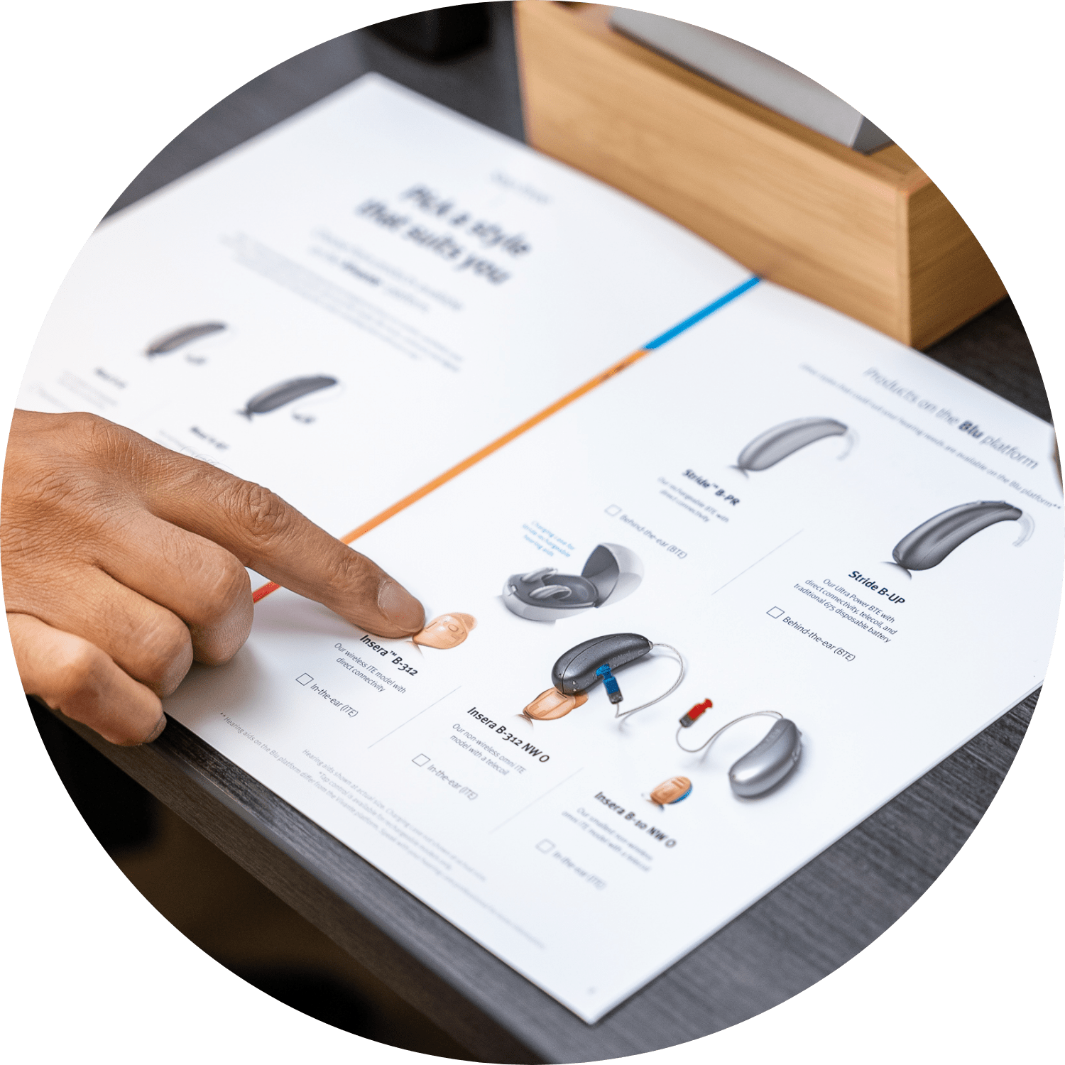 Hearing care specialist explaining hearing aid options